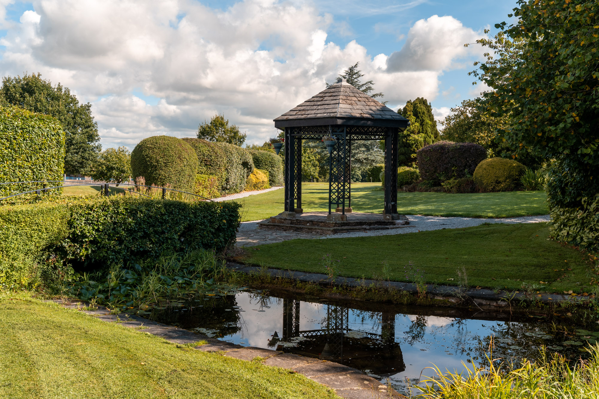 Landscaped gardens, pond and wedding pagoda at Mytton Fold Hotel