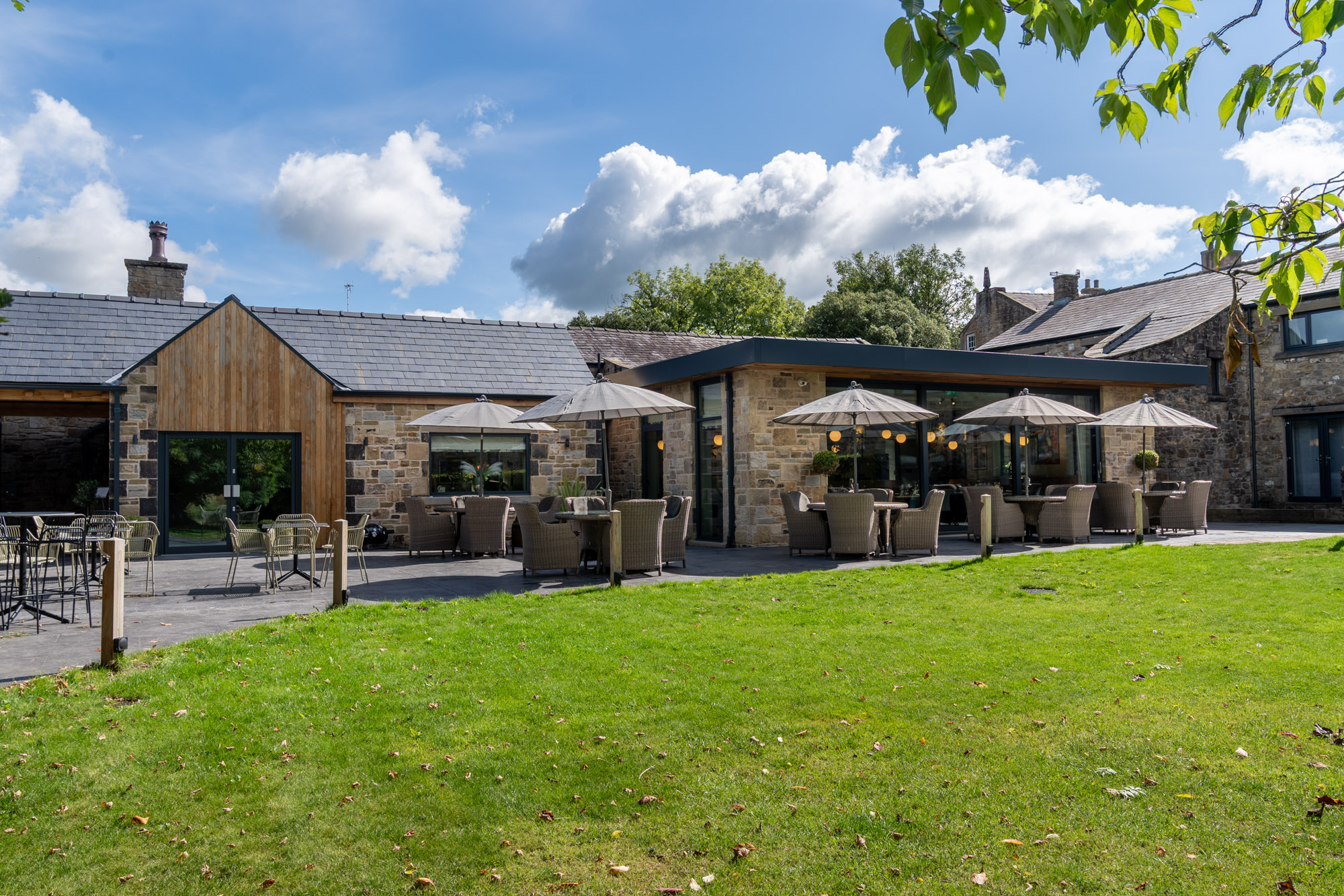 Garden terrace and reception spaces at Mytton Fold Hotel