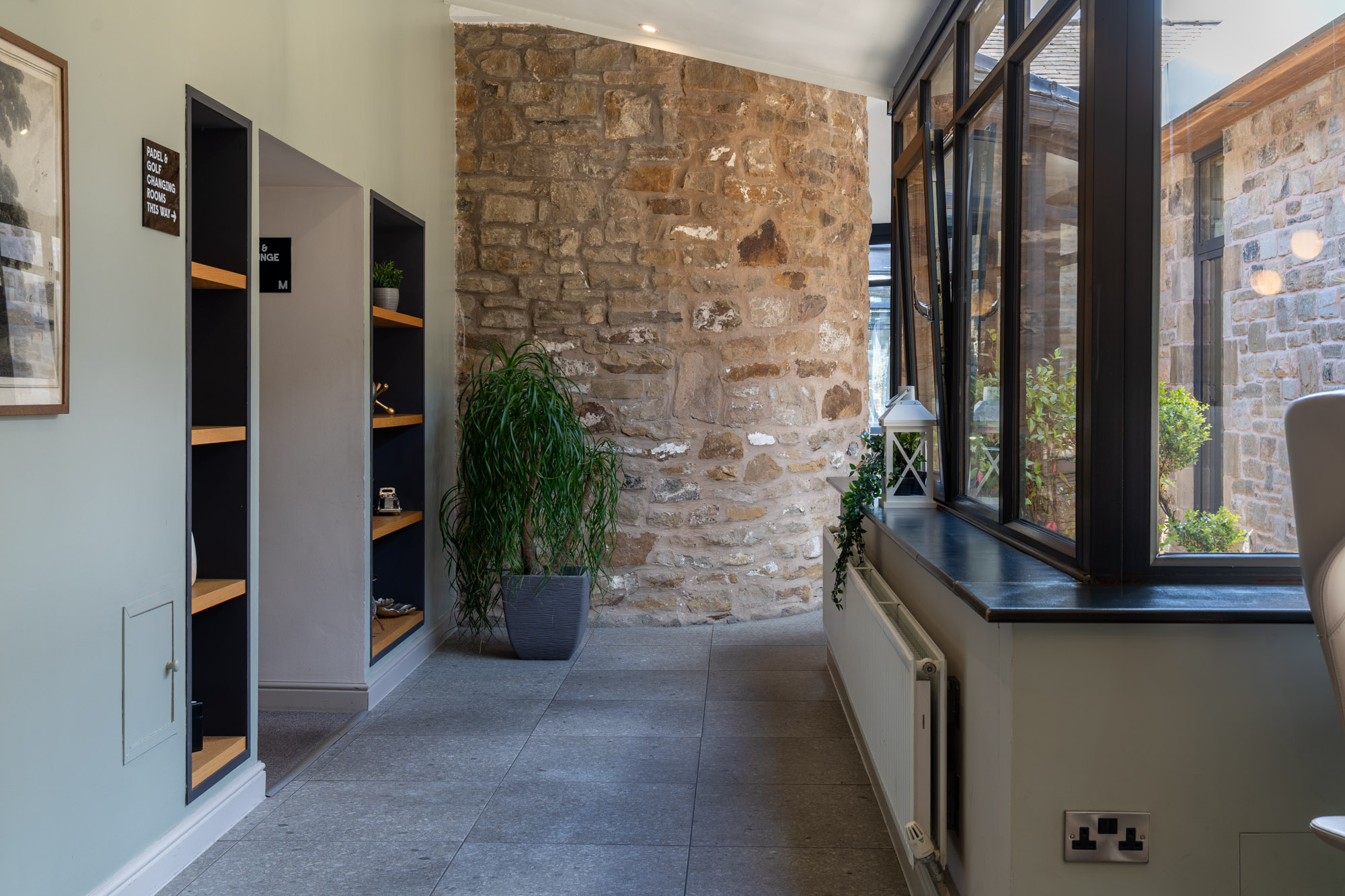 Light-filled stone interior at Mytton Fold Hotel