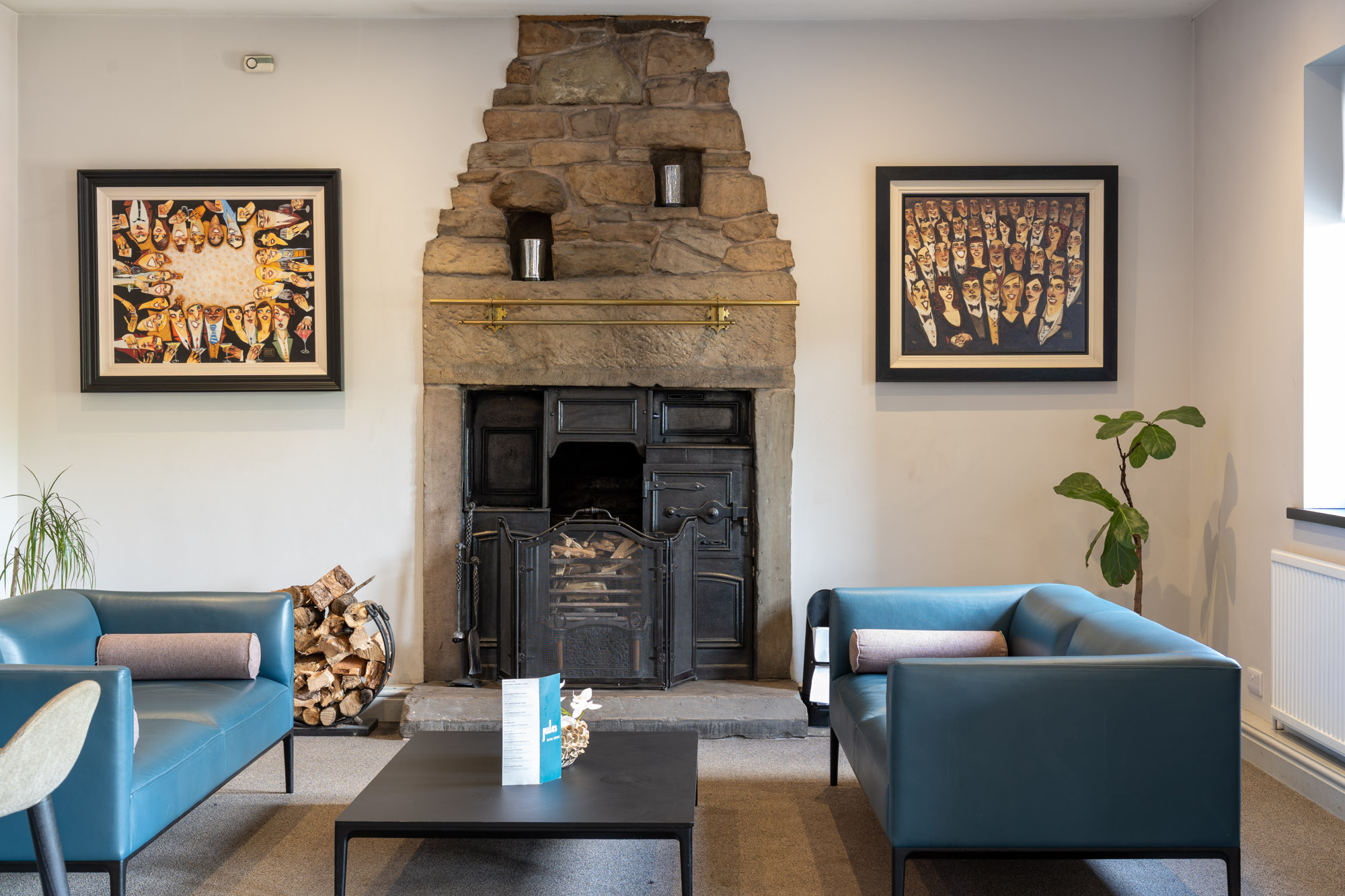 Character lounge and stone fireplace at Mytton Fold Hotel