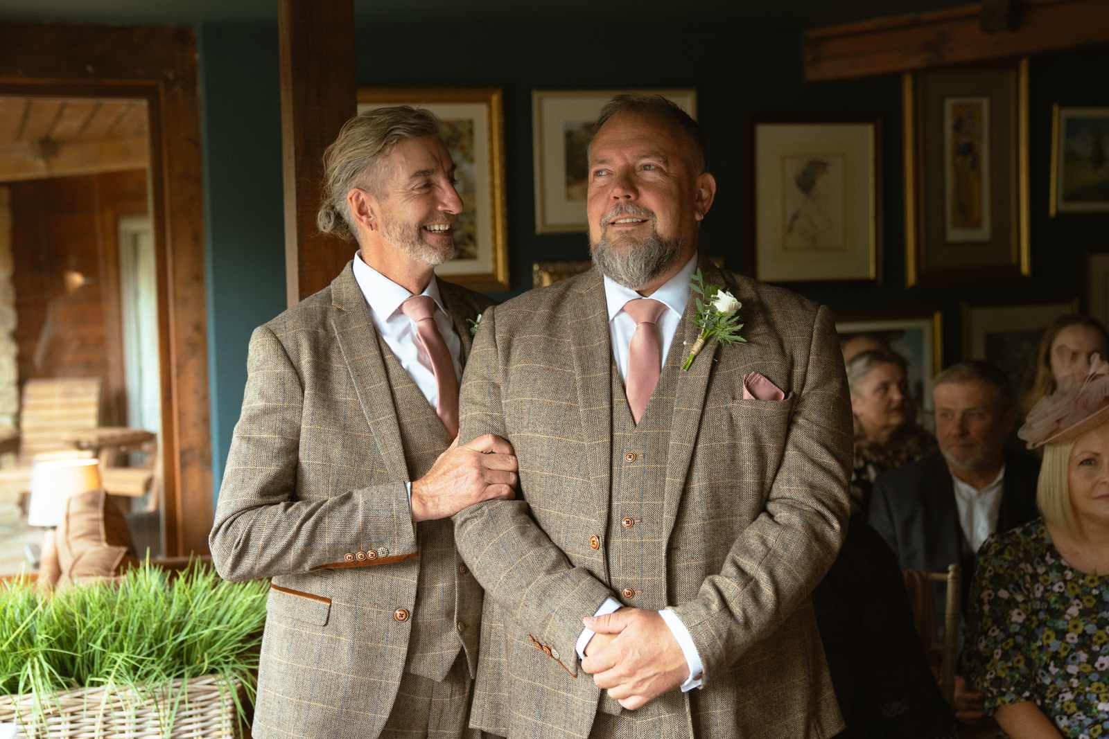 Chris turning to see Mandy as she arrives for their ceremony at Chevin Country House