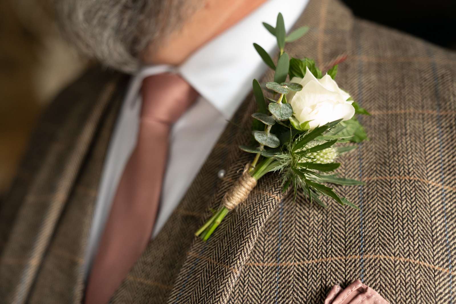 Detail of the groom's buttonhole flower