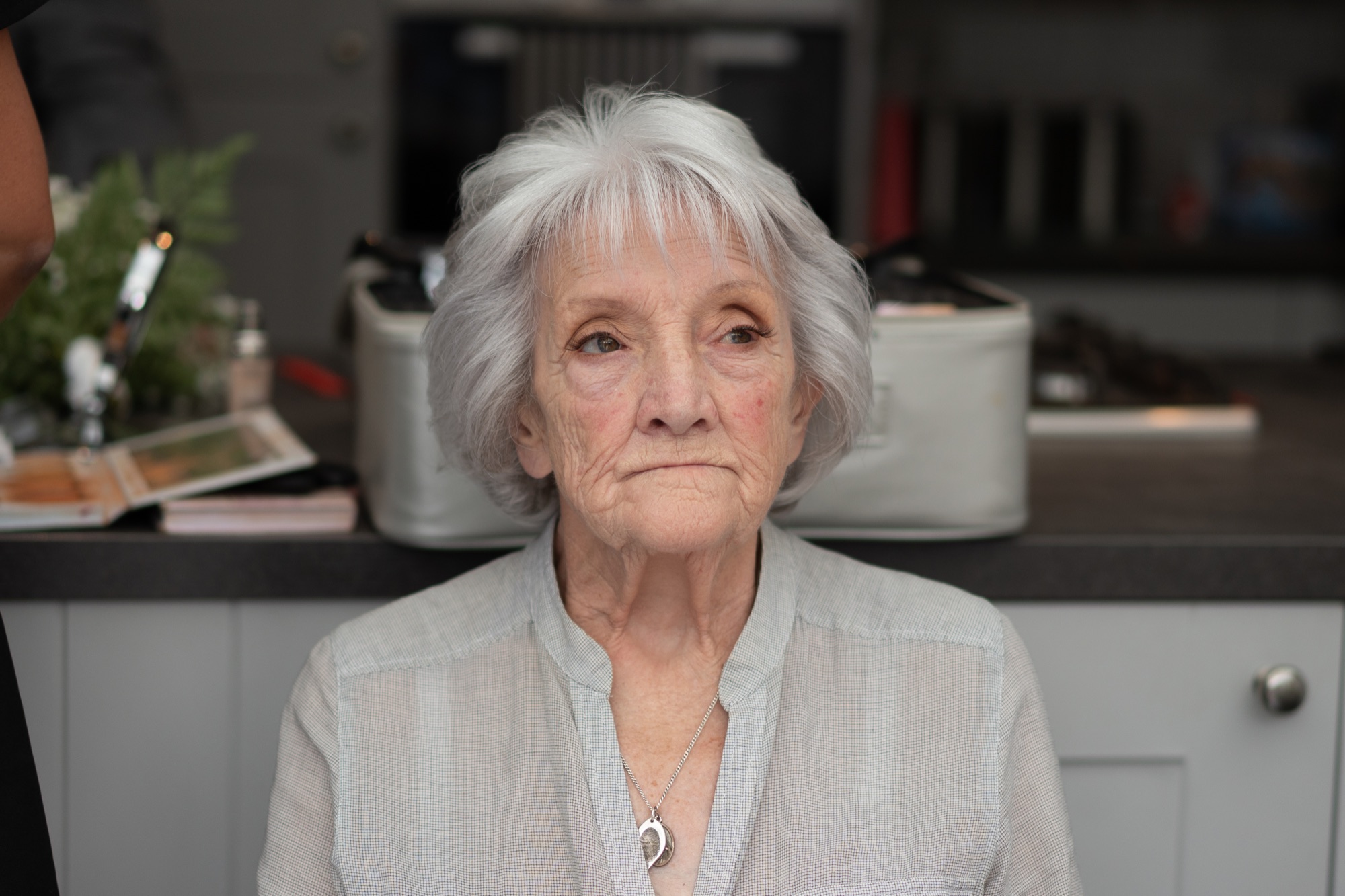 Portrait of an elderly relative seated before the ceremony