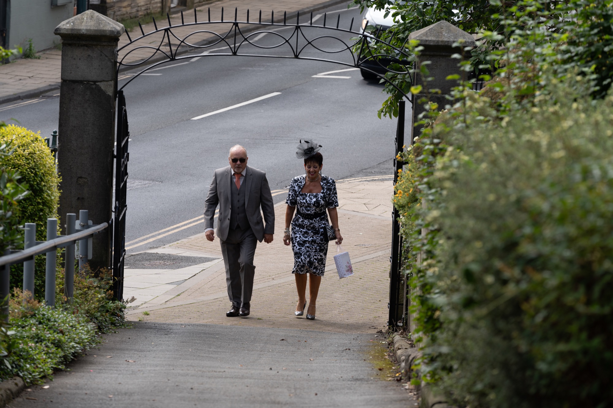 Wedding guests walking up to St Mary's Church, Todmorden, ahead of the ceremony